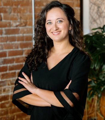 Portrait of Marisa McDonough-Heath, Director of Operations.